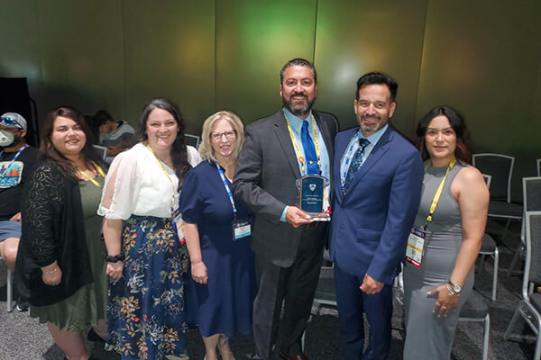 Erik, Dr. Jose Fierro and CSEA members