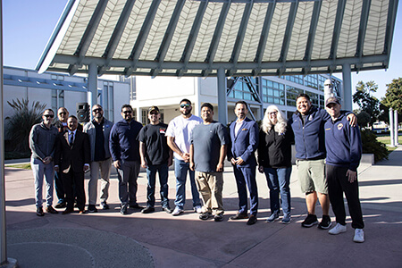 Student veterans at the flag raising