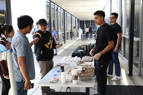 Students at the MRE tasting booth