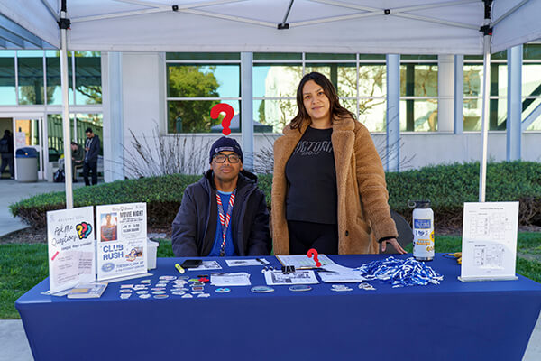 Ask Me table volunteers