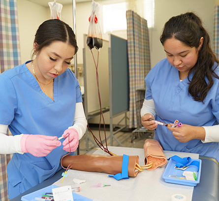 Two female medical assistants