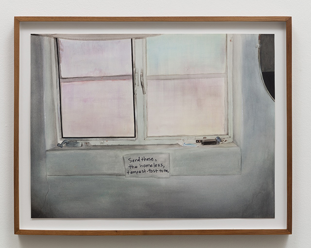 A window with a hand-written note.