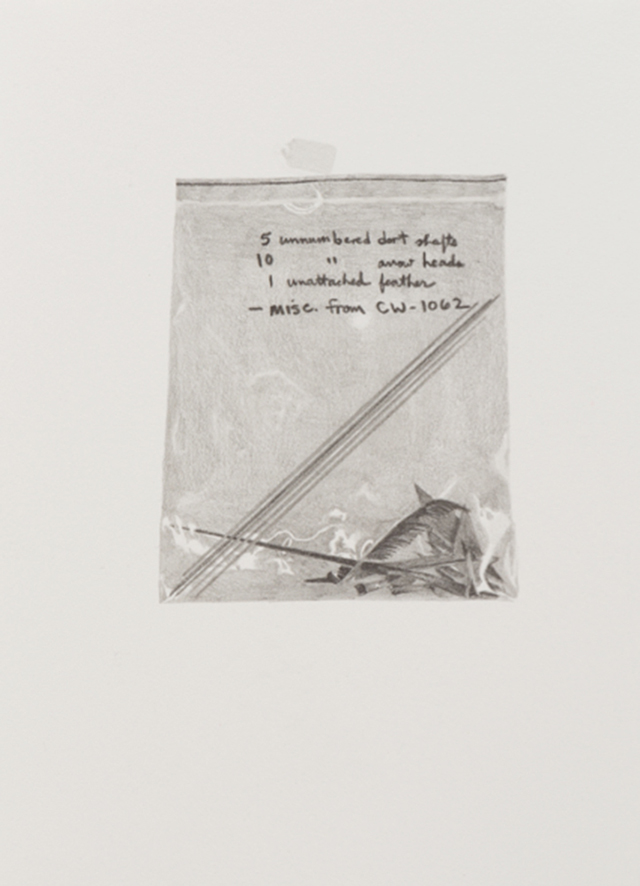 A drawing of a bag with spearheads.
