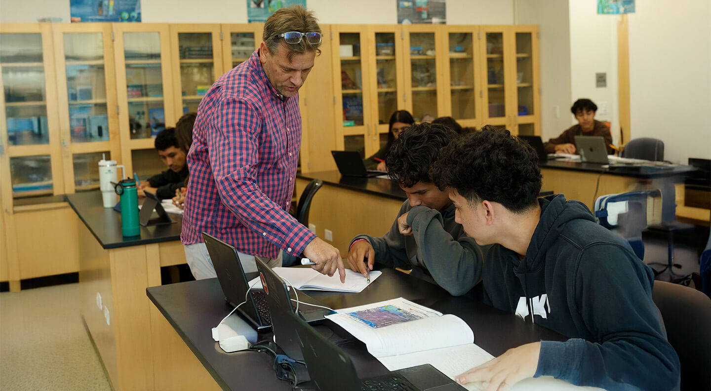 instructor helping students