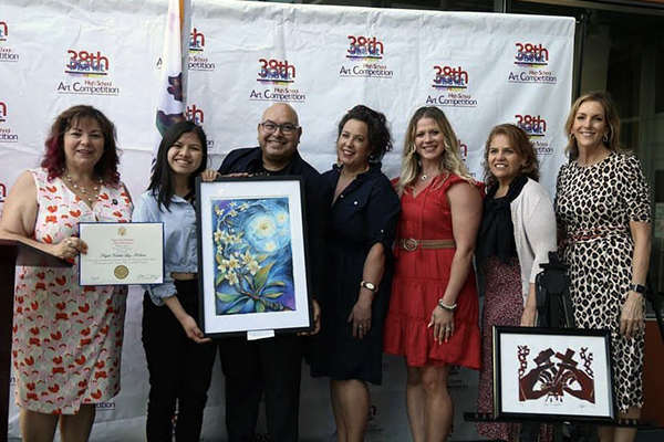 Art competition participants and Linda Sanchez