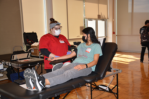A student donating blood