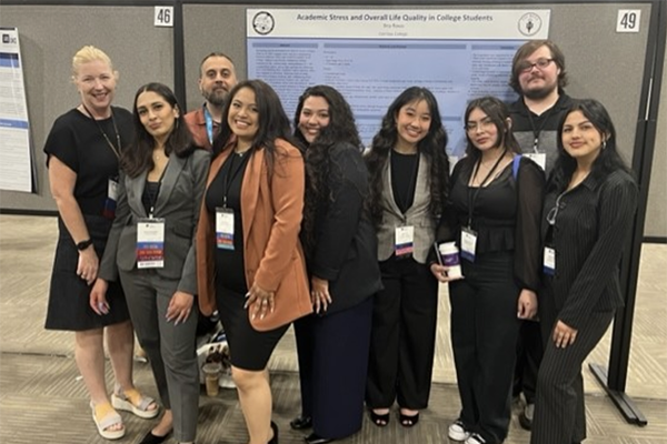 Psychology students and Dr. Duff at the conference