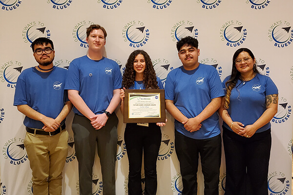 Team F.I.R.E. with the award
