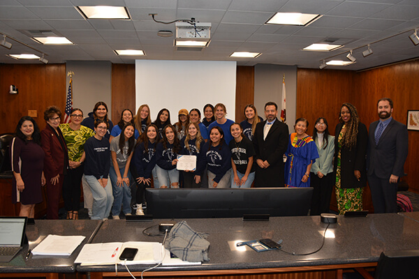 Women's volleyball team and the board