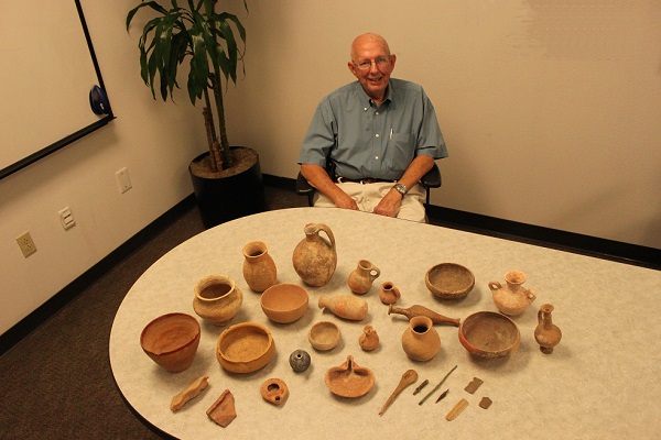 John Grindel with the artifacts