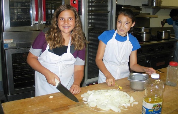 Children chopping onions