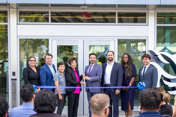 Officials cutting ribbon for the health science building