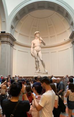 Students viewing Michelangelo's David