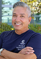 Irving Bartikofsky wearing a blue SAS shirt