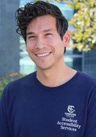Christopher Elquizabal wearing a blue SAS shirt