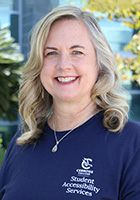 Janice O'Neal wearing a blue SAS shirt