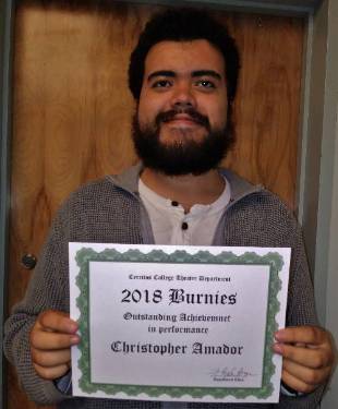 Christopher Amador with his achievement certificate.